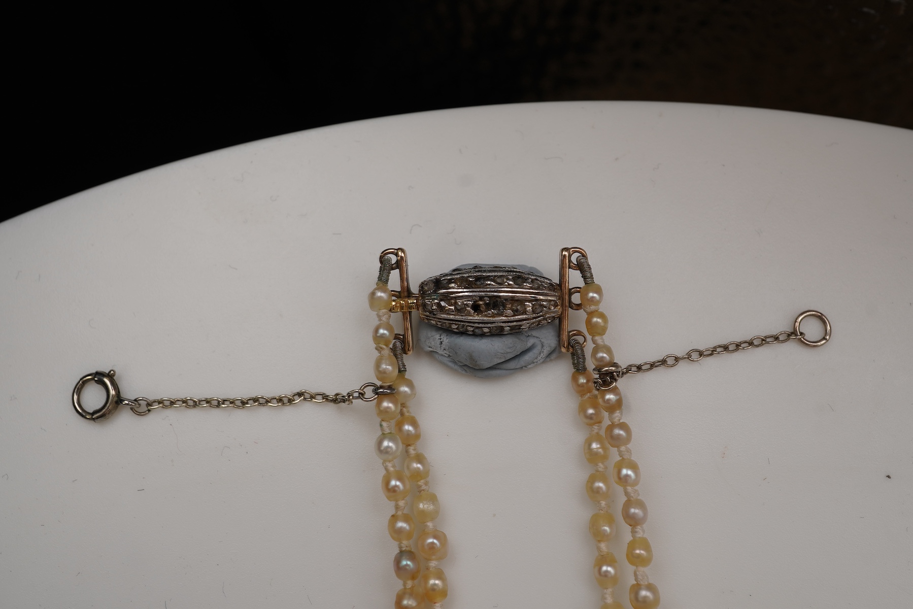 A natural pearl and diamond necklace, early 20th century